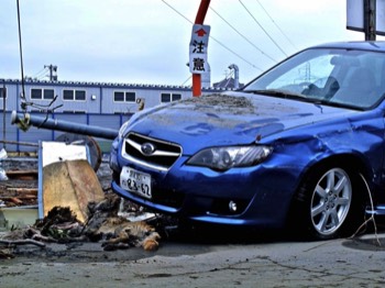  3/14 “Caution” sign, abandoned car, and dead dog, Ishinomaki City 