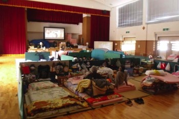  6/18 survivors in temporary housing watching movie, Kesennuma City 